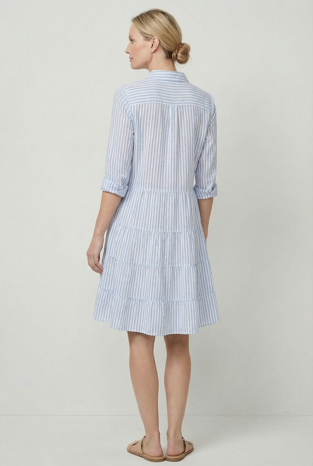 Women's stripe print summer dress, close-up of fabric and pattern