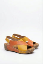 Women's vegan leather sandals, sole view showing shock-absorbing rubber