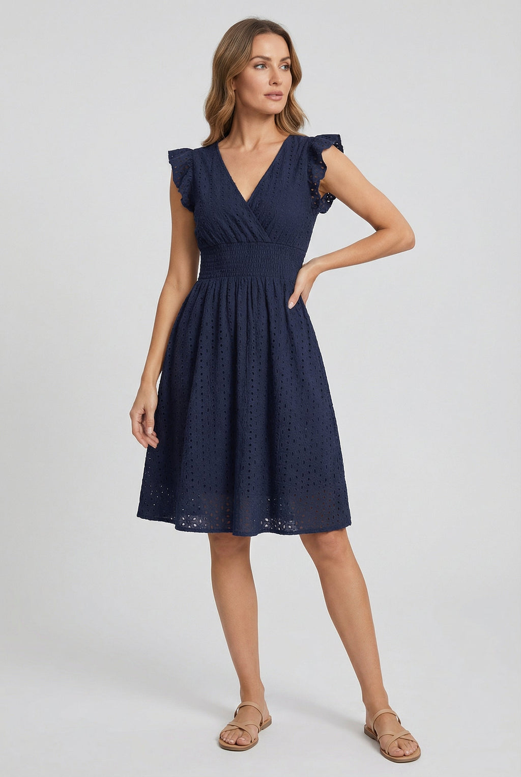 Women's A-line summer eyelet dress, close-up of smocked waistband