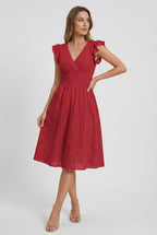 Women's A-line eyelet dress, styled for a summer garden occasion