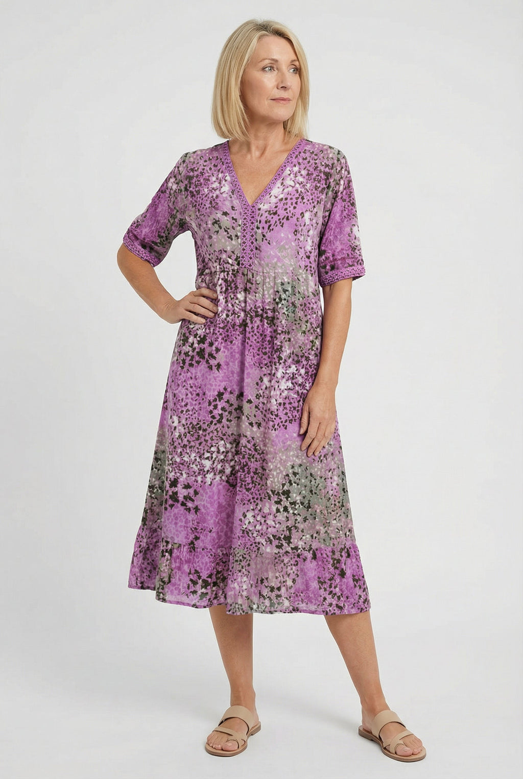Women's flowy abstract print dress, full length side view