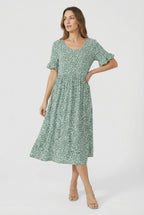 Women's relaxed fit summer midi dress, styled for a garden occasion