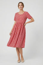 Women's summer midi dress, close-up of fabric and neckline detail