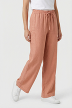Women's linen straight-leg trousers, side view showing silhouette