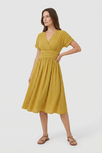 Women's flared midi dress, fabric drape close-up