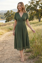Women's cocktail midi dress styled for a smart occasion, full length