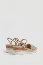Women's platform wedge sandals, close-up of woven texture