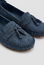 Women's loafers with bow, close-up of bow and hand-stitched detail