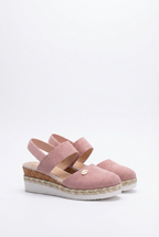 Women's wedge sandals, close-up of espadrille sole texture
