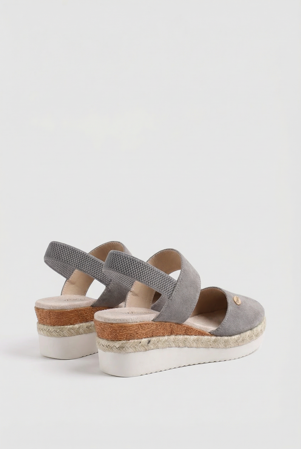 Women's closed toe espadrille sandals, close-up of strap and buckle