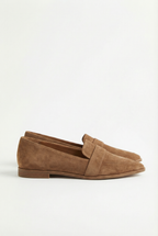 Women's suede loafers, side view showing lightweight sole