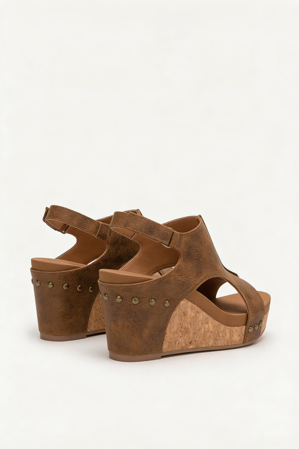 Women's vegan leather platform sandals, close-up of cork wedge sole