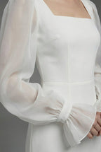 Women's white long sleeve floor-length maxi dress – back view