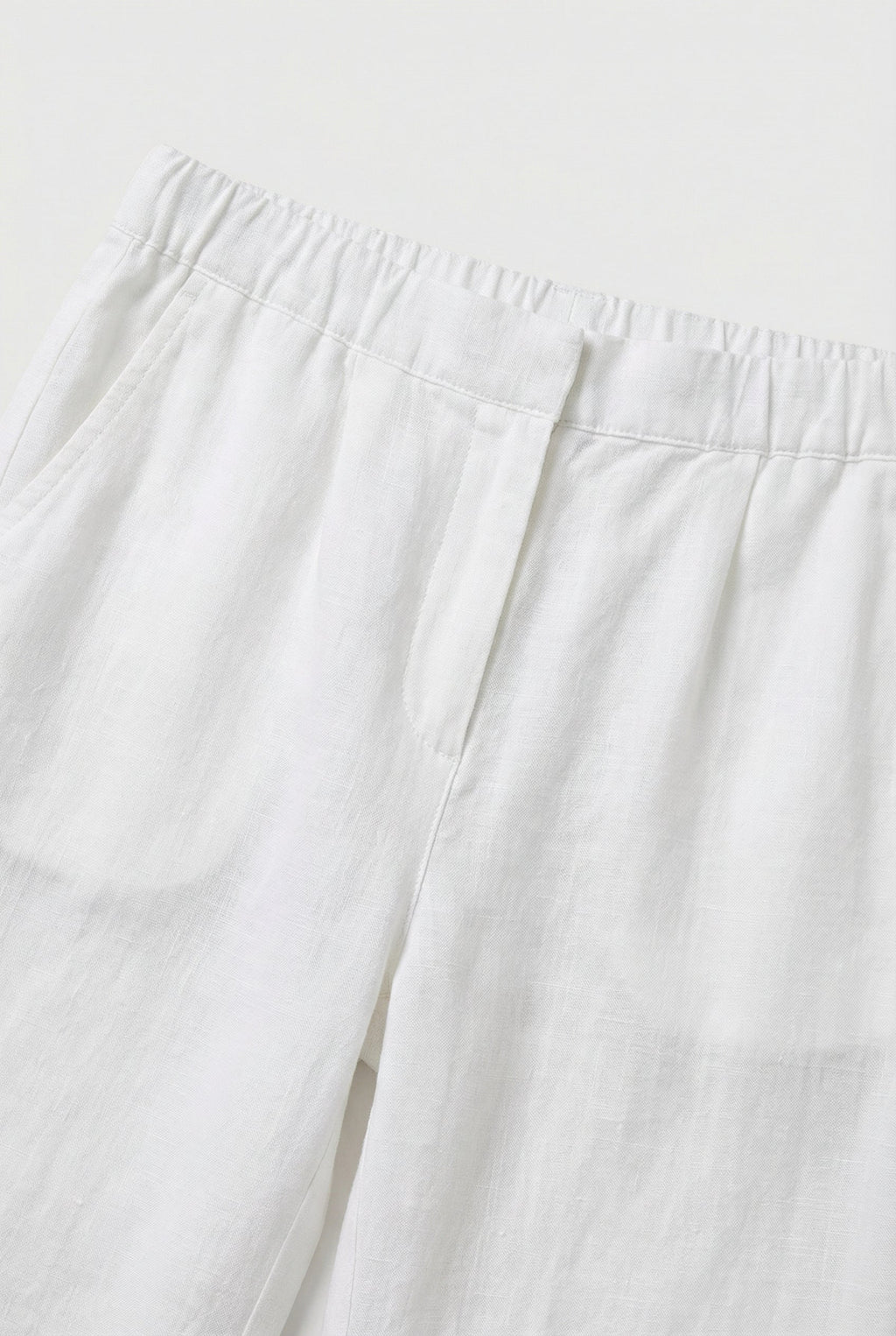 Women's lightweight trousers styled with a blouse, full length