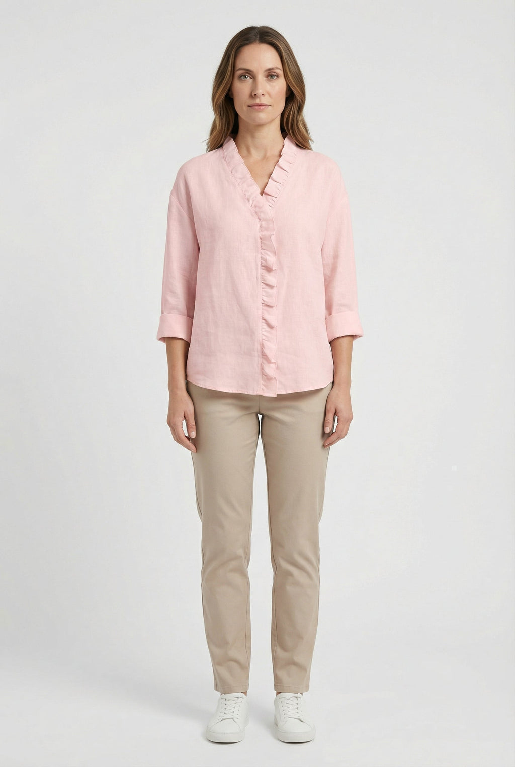 Women's long sleeve blouse with ruffle front, side view