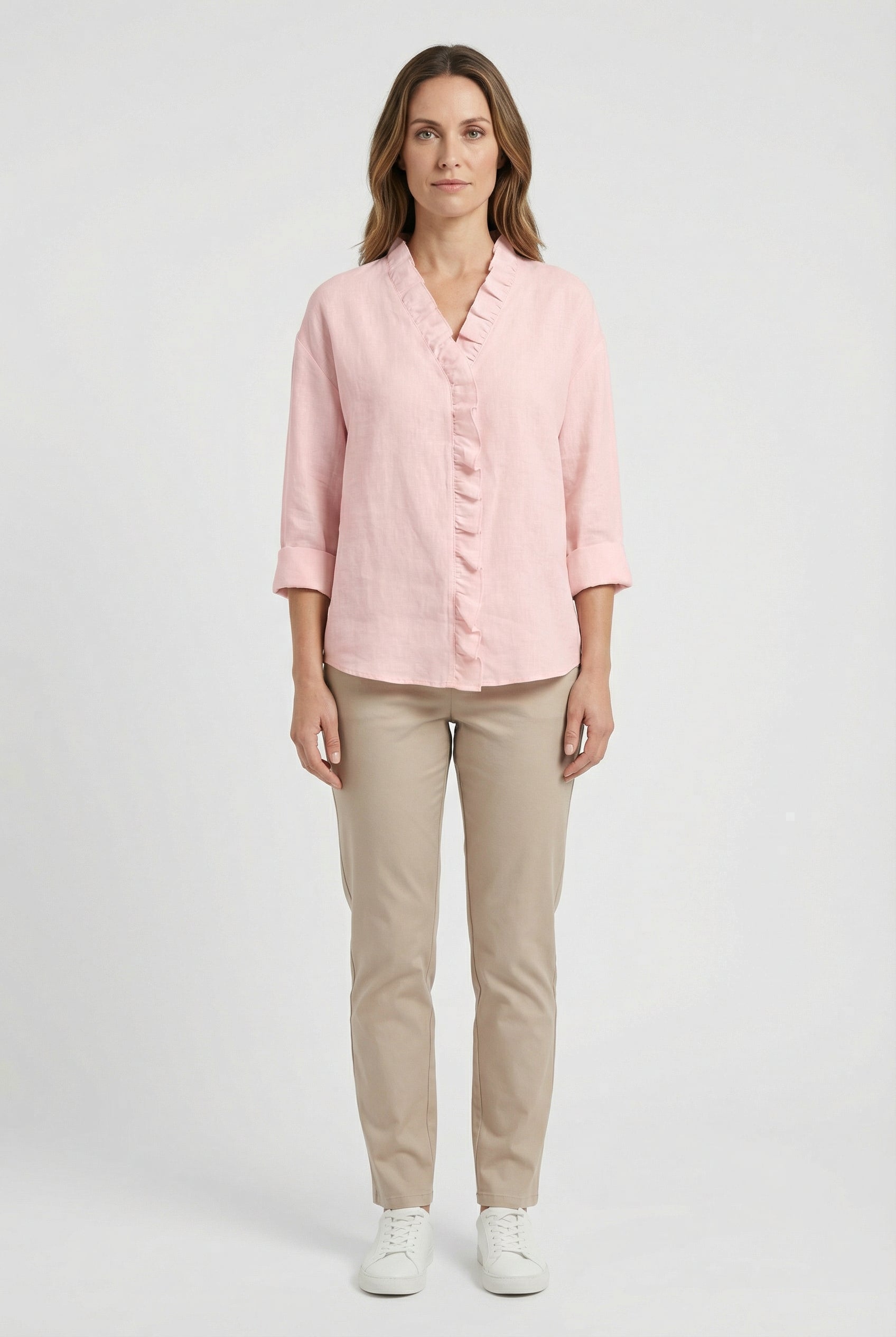 Women's long sleeve blouse with ruffle front, side view