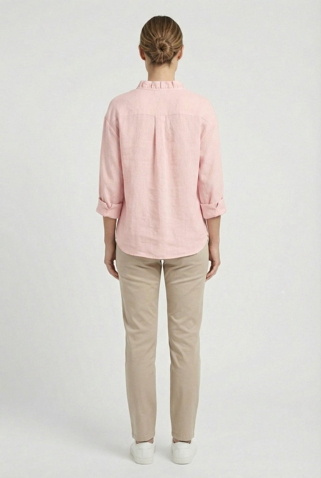 Women's relaxed fit ruffle blouse styled with trousers