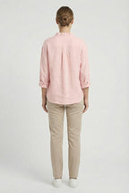 Women's relaxed fit ruffle blouse styled with trousers