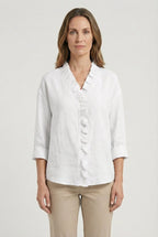 Women's ruffle blouse, back view showing relaxed silhouette