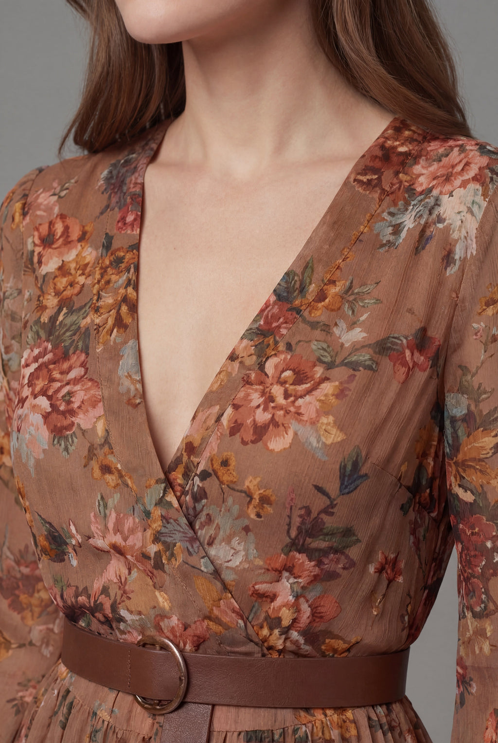 Boho floral maxi dress in brown – deep V-neck wrap bodice close-up detail