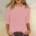 Pink crew neck 3/4 sleeve top, front view