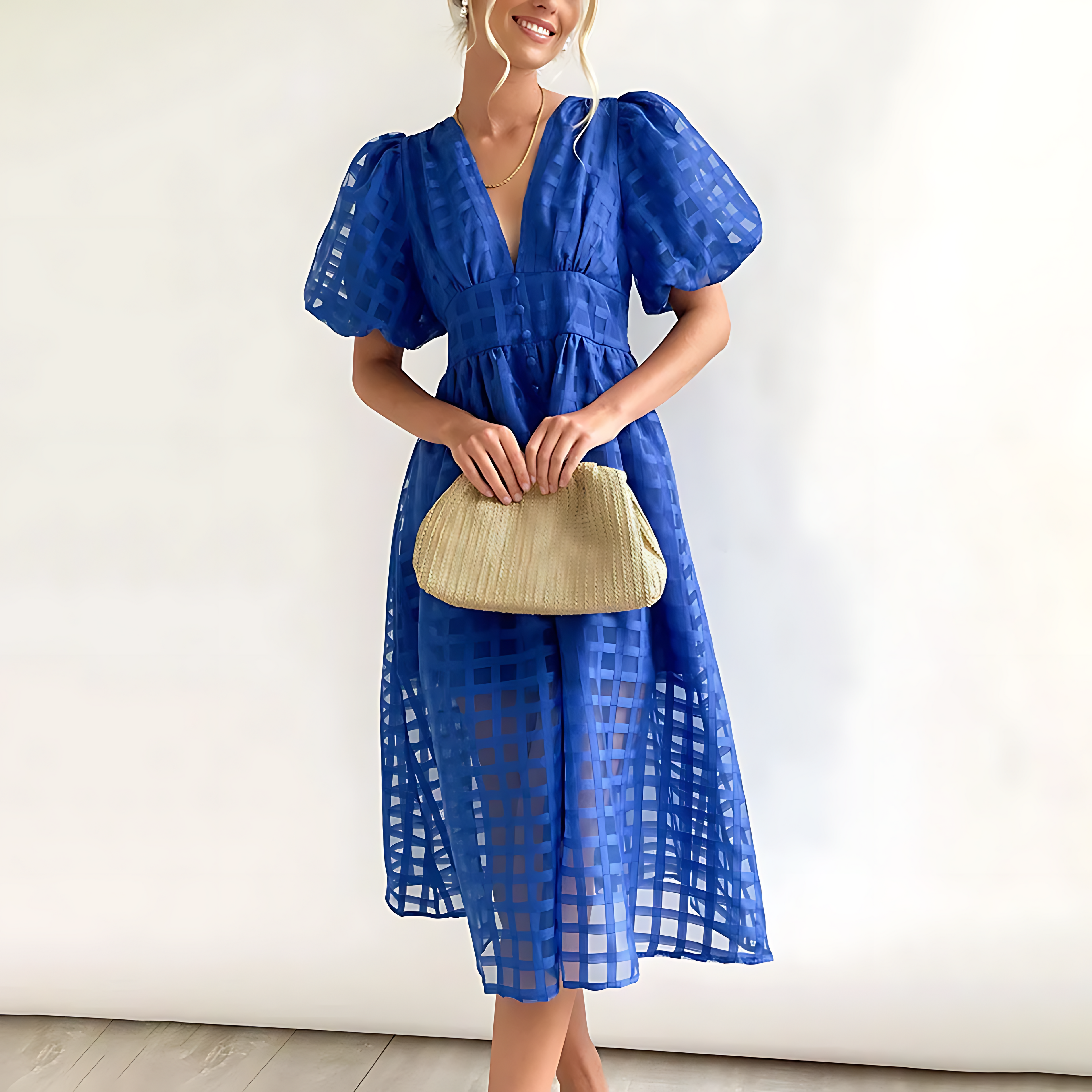 Women's vintage-inspired square pattern midi dress with puff sleeves, three-quarter view