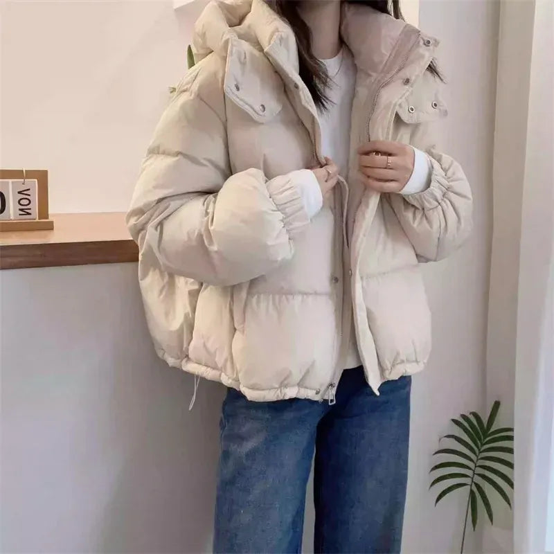 High neck quilted hooded puffer jacket with a high neck design