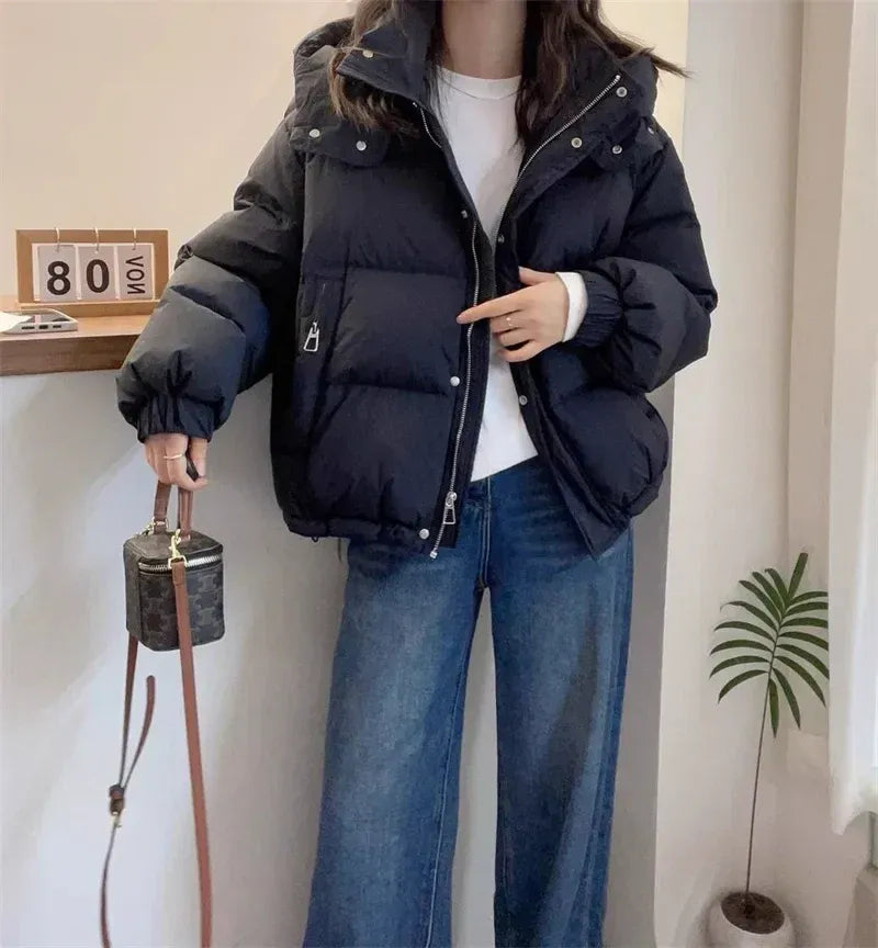 High neck quilted hooded puffer jacket with a quilted construction