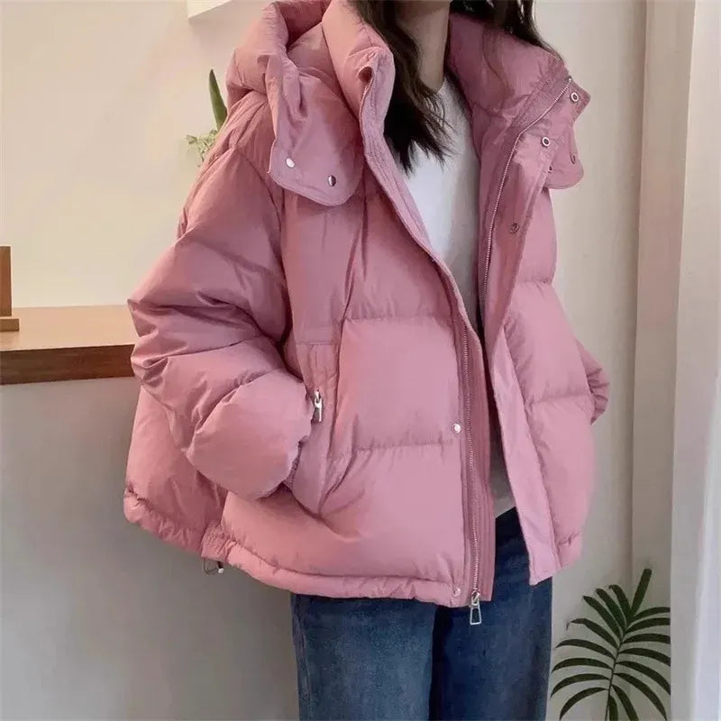 High neck quilted hooded puffer jacket with a zip up front