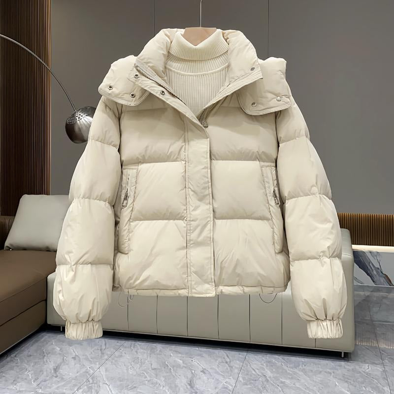 High neck quilted hooded puffer jacket with an attached hood