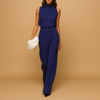 Women's halter neck wide leg jumpsuit in navy blue – high waist sleeveless front view
