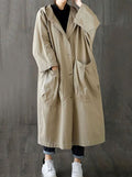 Oversized hooded water repellent flared trench coat with a water repellent finish