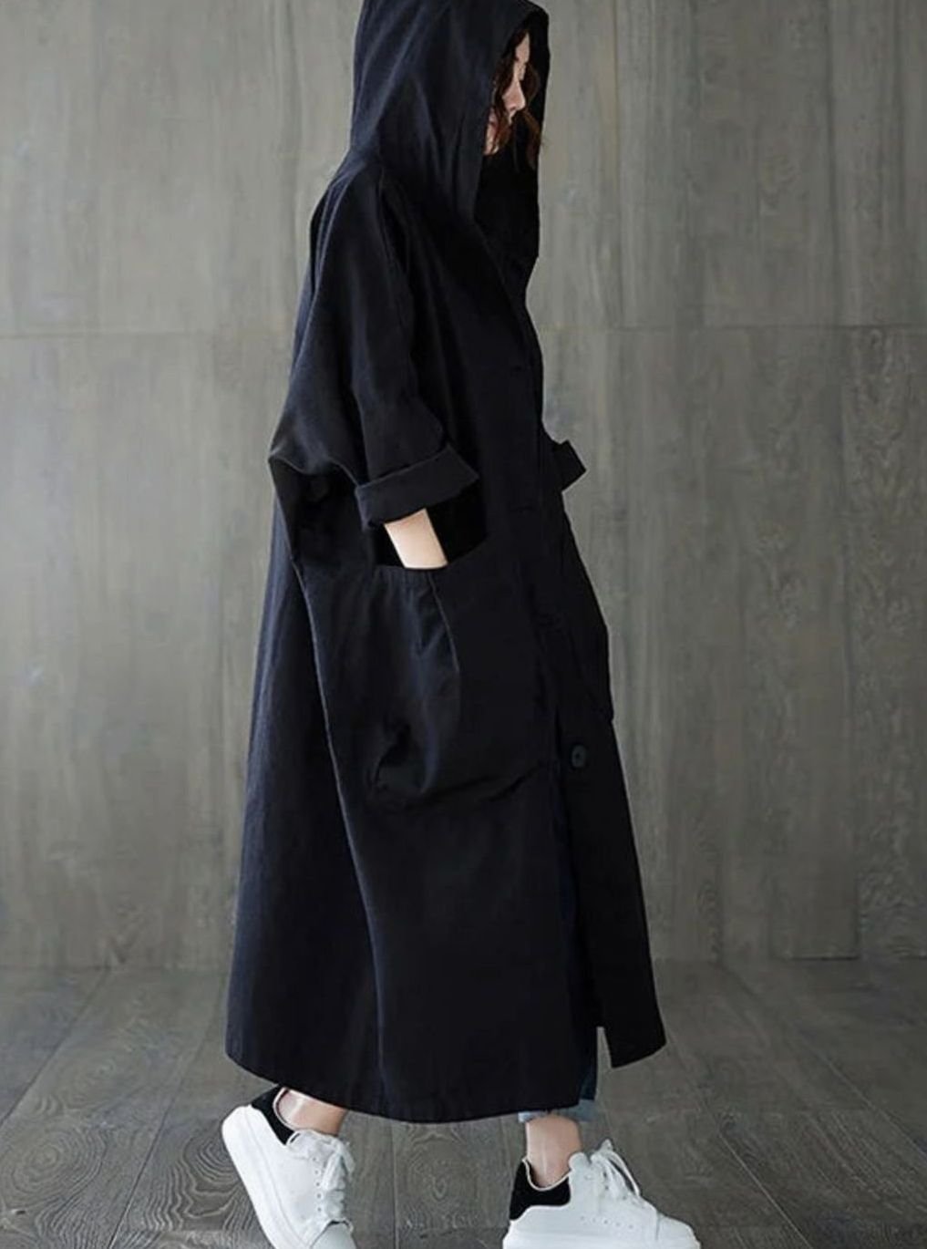 Oversized hooded water repellent flared trench coat with large flap pockets