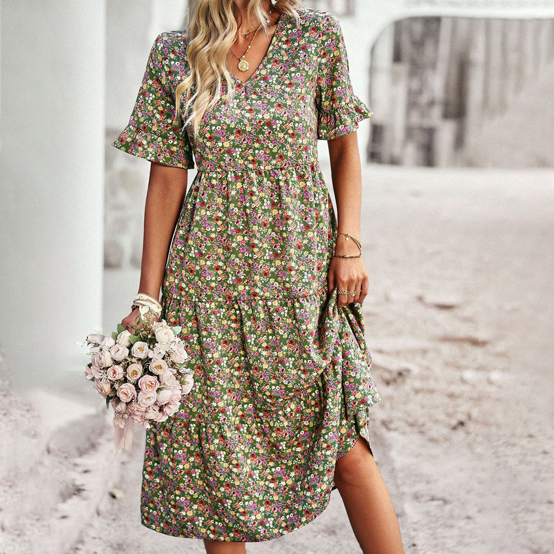 Floral wedding guest midi dress in black, back view