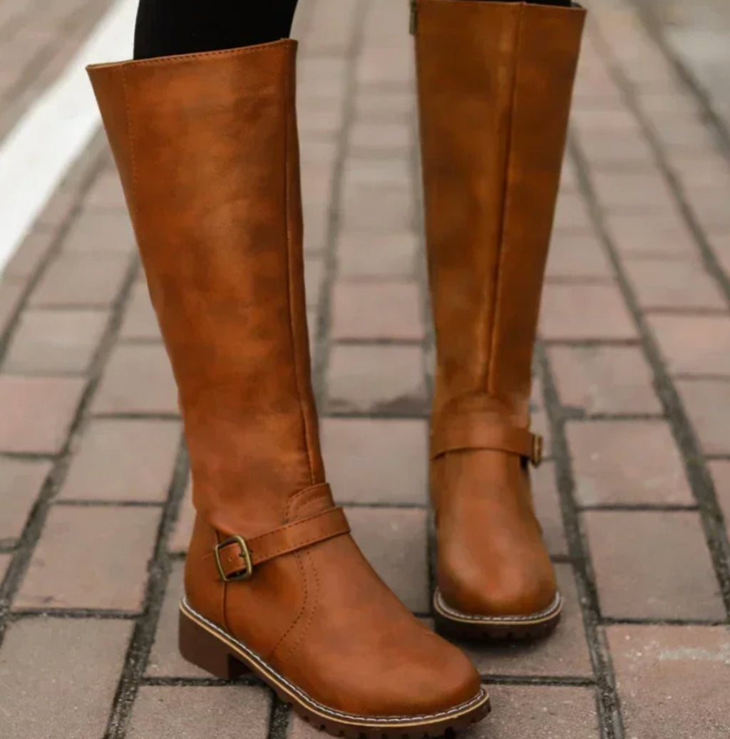 Brown leather ankle buckle block heel knee high riding boots, front view