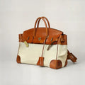 Light chocolate canvas overnight bag, front view