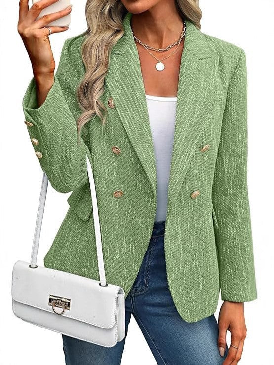 Green double breasted tailored blazer, close-up front view