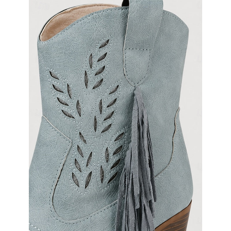 Close-up of embroidered stitching and side tassel detail on Blue Western Ankle Boots