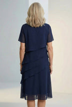 Women's ruffle midi dress with sheer sleeves, side view