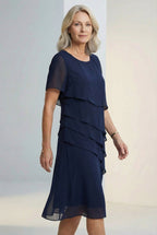 Women's ruffle midi dress with round neckline, back view