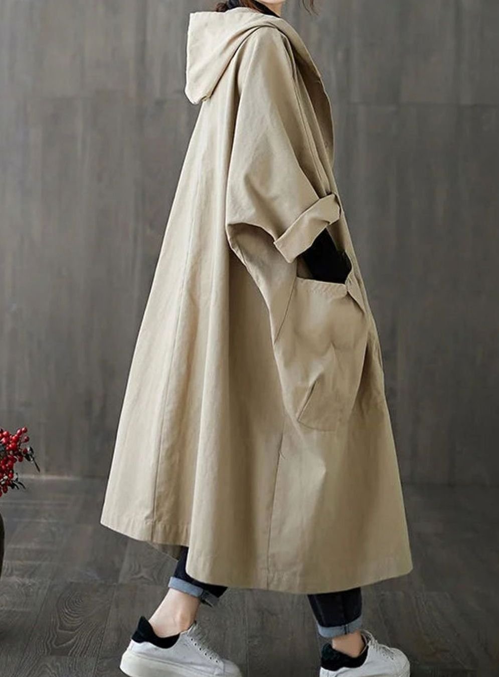 Beige oversized hooded water repellent flared trench coat, front view