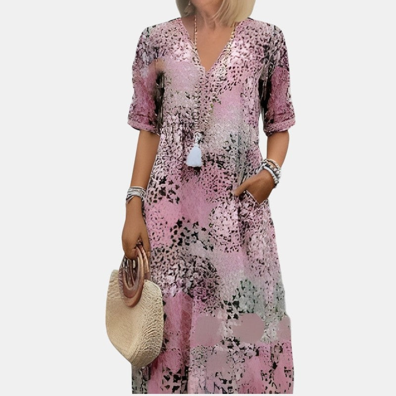 Relaxed floral V-neck midi dress in blue, styled on model
