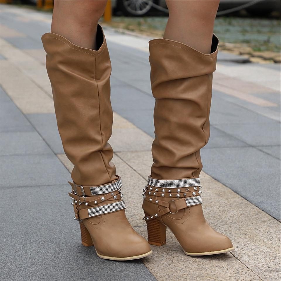 Slouchy studded block heel knee high boots with studded ankle straps