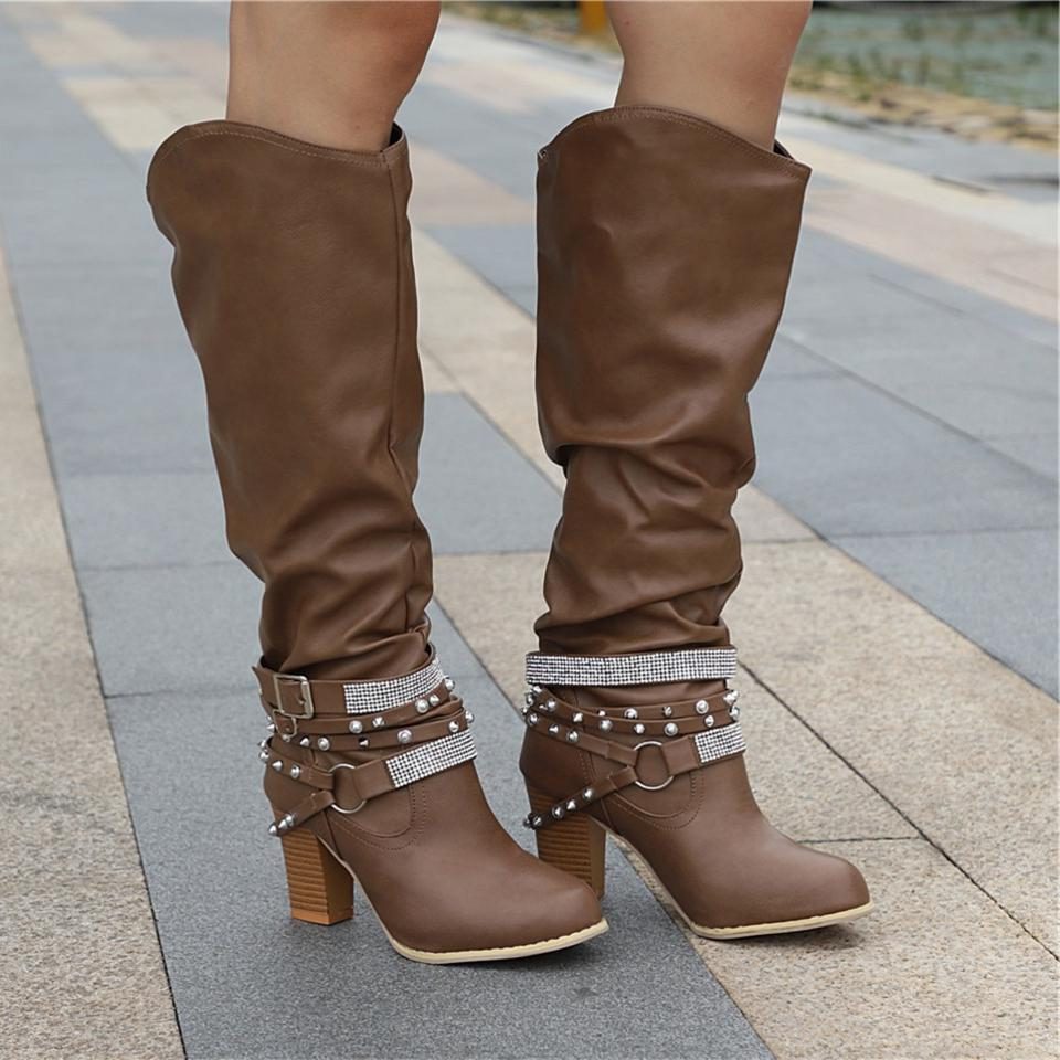 Slouchy studded block heel knee high boots with studded ankle straps