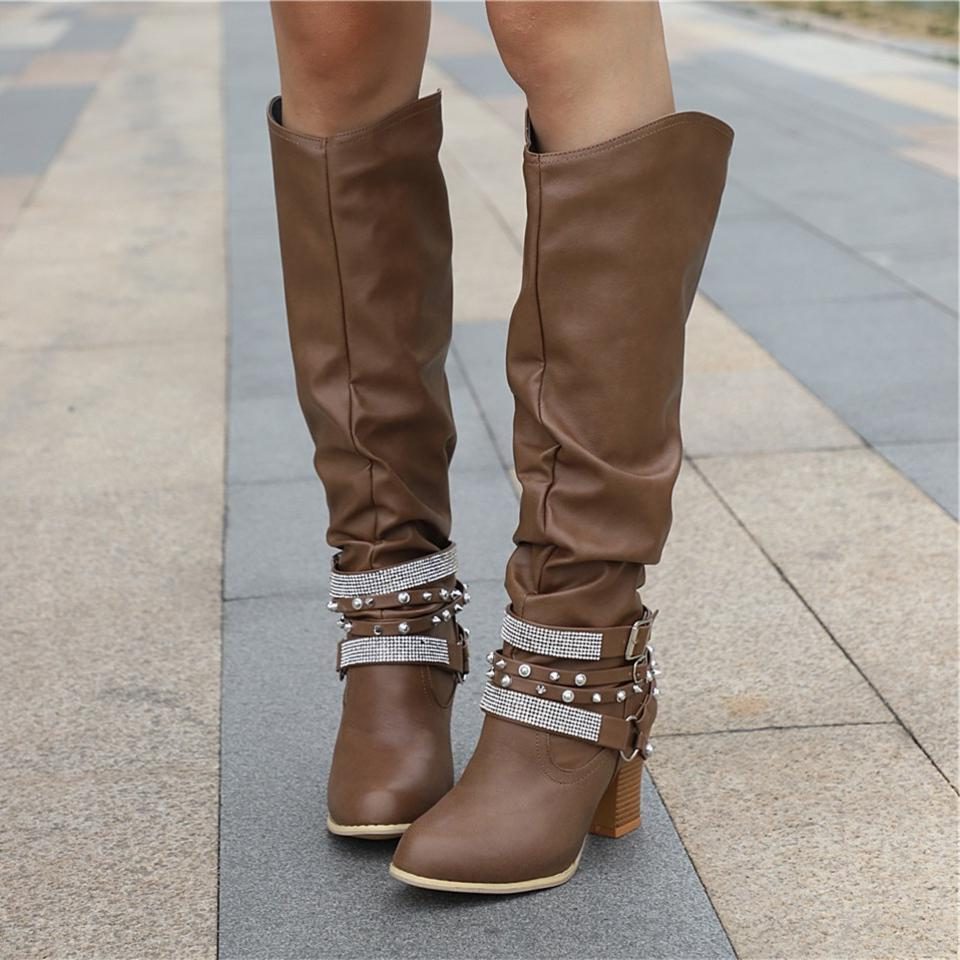 Slouchy studded block heel knee high boots with a knee high shaft