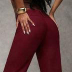 Flared high waist trousers close-up of hem and drape detail