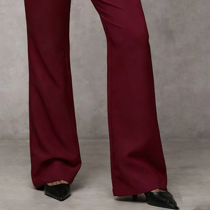 Women's wide leg flared trousers in classic shade, styled look