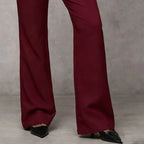Women's wide leg flared trousers in classic shade, styled look