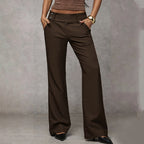 High waist flared trousers in neutral tone, full length view