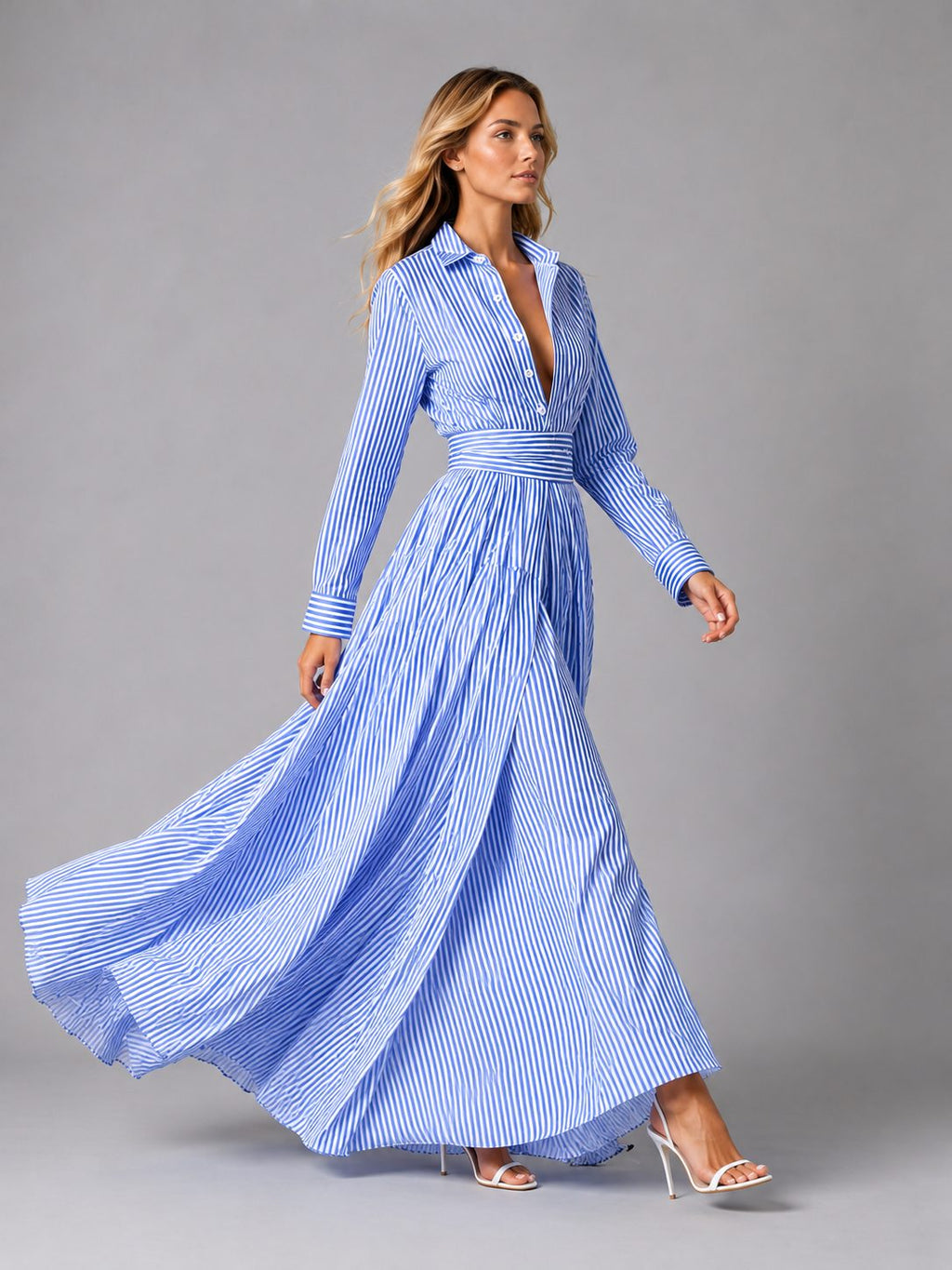 Blue and white striped maxi shirt dress, side view of flowing maxi skirt